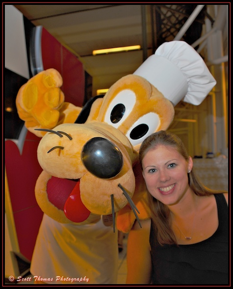Chef Pluto visits my daughter during dinner at Chef Mickey's in Disney's Contemporary Resort, Walt Disney World, Orlando, Florida