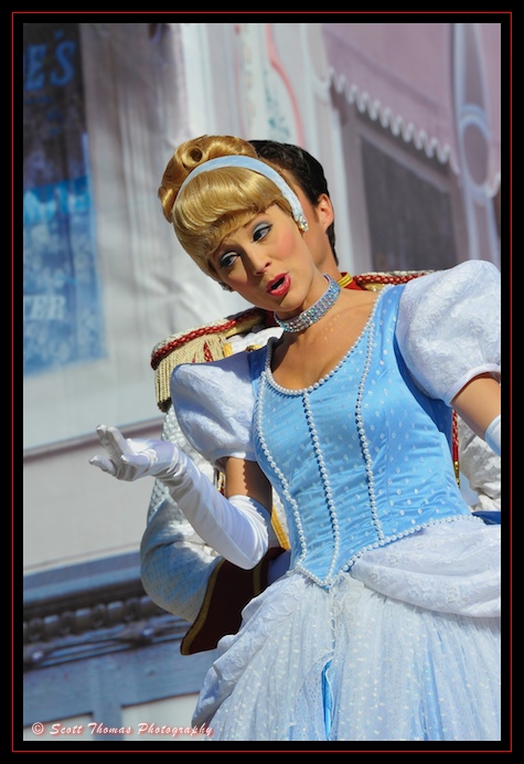Princess Cinderella nods to guests during the Celebrate a Dream Come True Parade in the Magic Kingdom, Walt Disney World, Orlando, Florida.