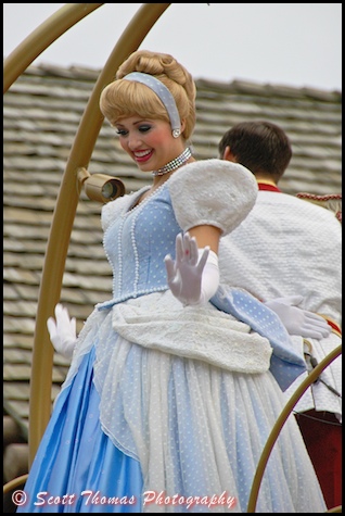 Cinderella waving to guests during the Celebrate a Dream Come True Parade in the Magic Kingdom, Walt Disney World, Orlando, Florida