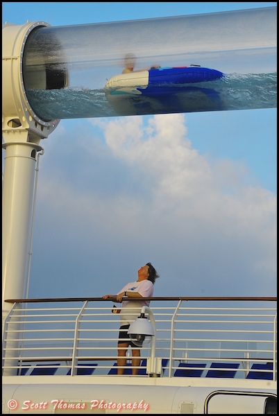 A guest rides the AquaDuck on the Disney Dream cruise ship.