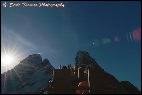 Sun near the summit of Everest in Disney's Animal Kingdom, Walt Disney World, Orlando, Florida.