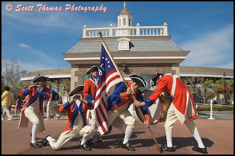 The Spirit of America Fife and Drum Corps performing outside the American Adventure in Epcot's World Showcase, Walt Disney World, Orlando, Florida.