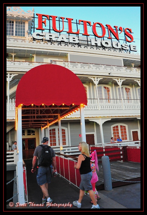 People walking over the gangplank to Fulton's Crab House restaurant in Downtown Disney, Walt Disney World, Orlando, Florida