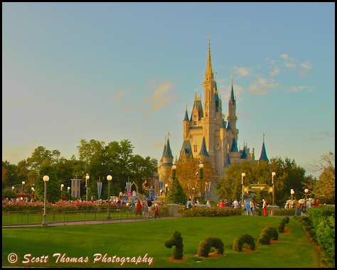 Golden sunlight illuminates Cinderella Castle in the Magic Kingdom, Walt Disney World, Orlando, Florida.