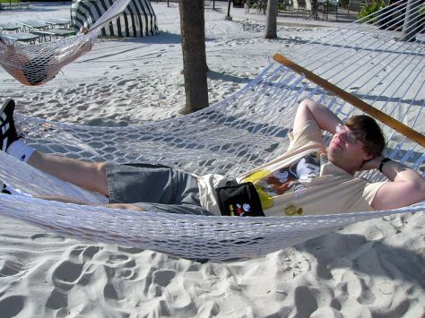 Picture This! blogger, Scott, relaxing in a hammock on the Polynesian Resort beach, Walt Disney World, Orlando, Florida