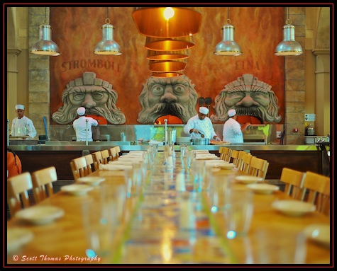 Chefs work to feed the three wood fired ovens at Via Napoli in Epcot's Italy pavilion, Walt Disney World, Orlando, Florida
