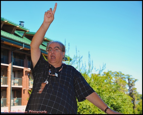 Jim Korkis making a point on a balcony at Disney's Wilderness Lodge resort, Walt Disney World, Orlando, Florida.