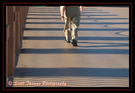 Walking over the pedestrian bridge from Disney's Boardwalk to the Swan Resort, Walt Disney World, Orlando, Florida