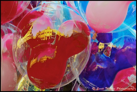 Balloons reflect Main Street USA in the Magic Kingdom, Walt Disney World, Orlando, Florida