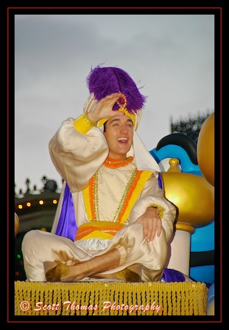 Aladdin waving to guests during a parade in the Magic Kingdom, Walt Disney World, Orlando, Florida