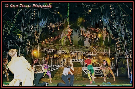 Tarzan and Jane swing on stage at Tarzan Rocks in Disney's Animal Kingdom, Walt Disney World, Orlando, Florida