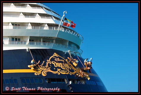 Sorcerer's Apprentice Mickey Mouse cleans the bow of the Disney Dream cruise ship, Disney Cruise Line, Bahamas