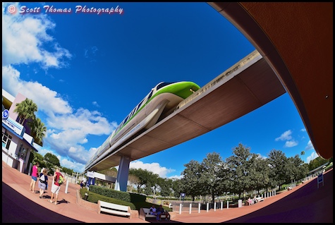 Monorail Green heading into Epcot over the entrance to the park, Walt Disney World, Orlando, Florida