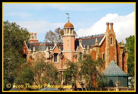 The Haunted Mansion in bright sun in the Magic Kingdom, Walt Disney World, Orlando, Florida.