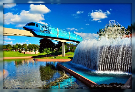 TRON Legacy monorail going past the Imagination Pavilion in Epcot, Walt Disney World, Orlando, Florida