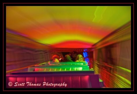 Riding the Tomorrowland Transit Authority PeopleMover at night in the Magic Kingdom, Walt Disney World, Orlando, Florida