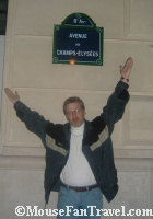 Chris in front of Champs Street Sign